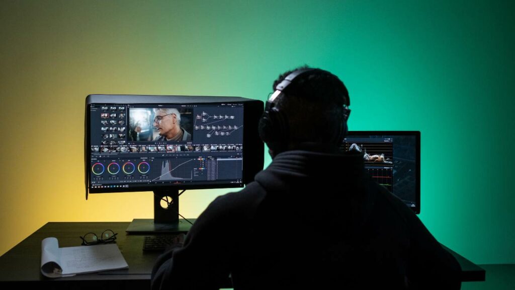 Filmmaker editing a corporate video in post-production